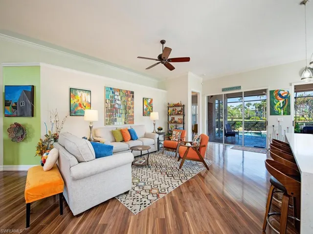 Bright and airy great room open to the  kitchen and lanai