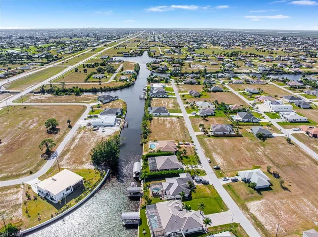 Aerial view of residential area with a nearby body of water