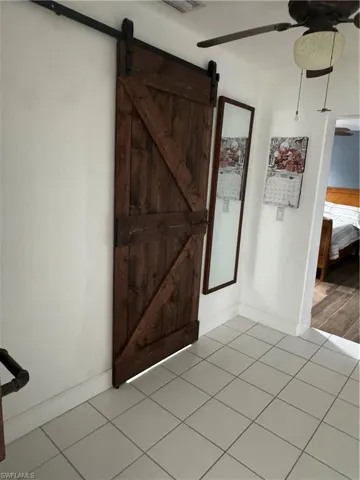 Barn doors for the master closet and bath