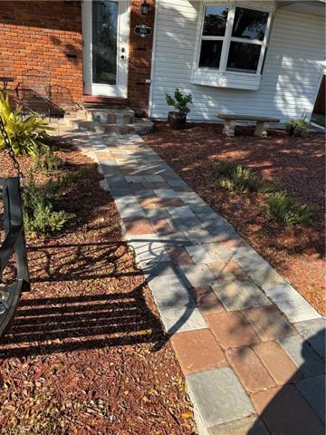 Such a pretty walkway to the front door.