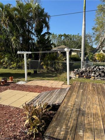 Mulch and pavers surround the home. Ready to burn firewood for the fire pit.