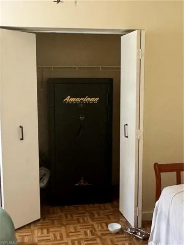 Safe in third bedroom closet conveys with the home