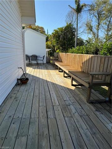 Pretty wooden deck and tons of seating