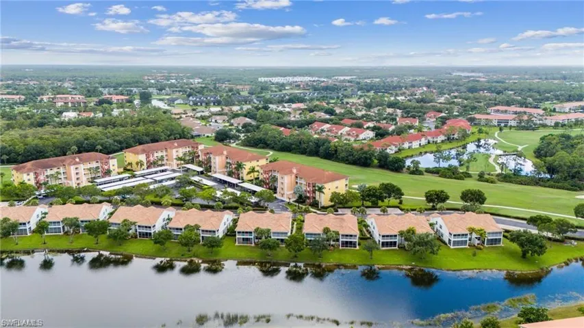 Aerial view of a nearby body of water and a local golf course