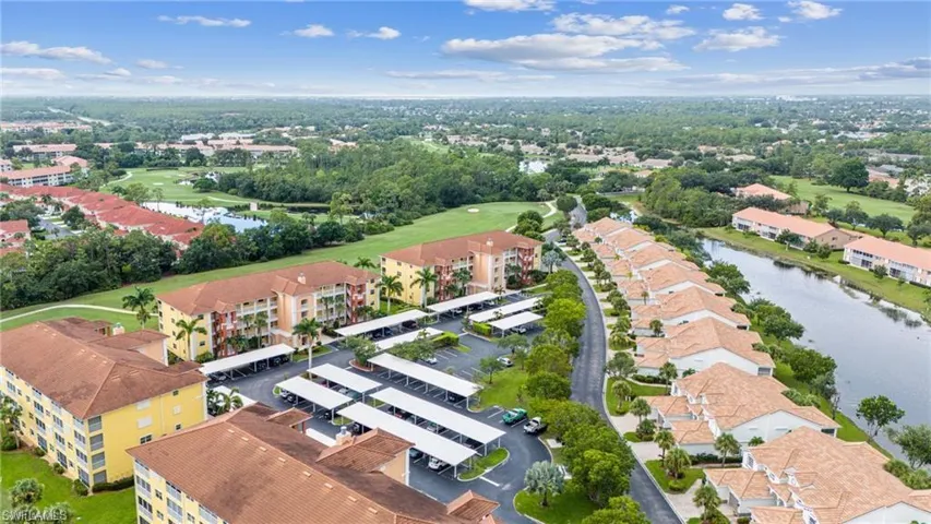 Bird's eye view of a nearby body of water and a local golf course