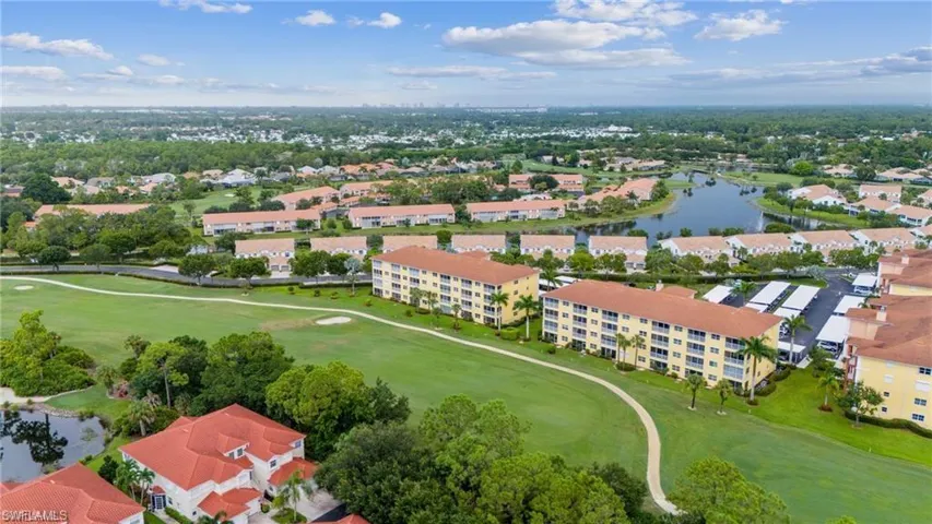 Bird's eye view of a local golf course and a large body of water