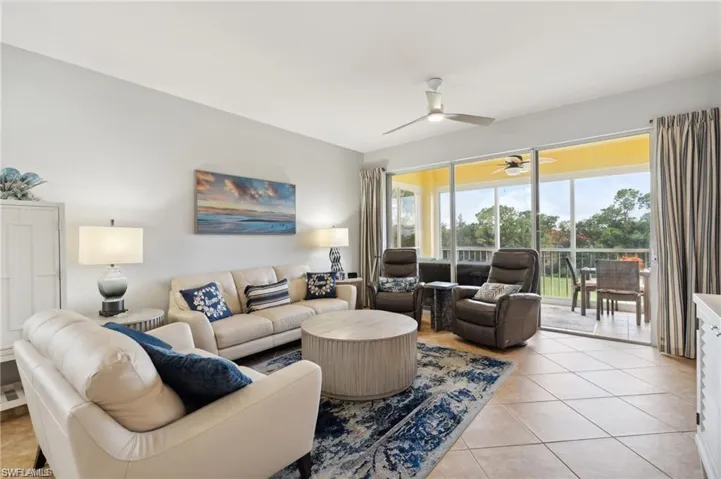 Living area with light tile patterned floors