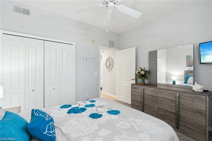 Bedroom featuring a closet and ceiling fan