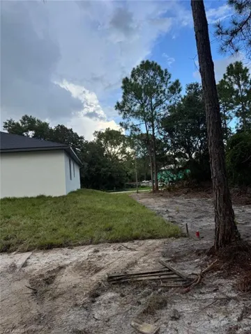 View of yard featuring view of scattered trees