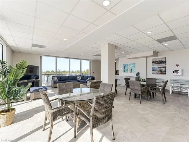 Dining room featuring a paneled ceiling and recessed lighting