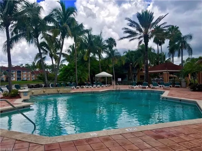 Community pool featuring a gazebo and a patio