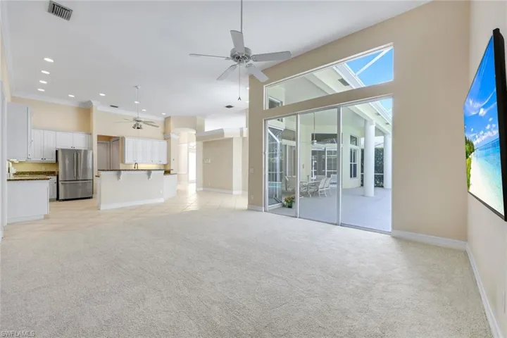Family room features overlooking the pool and lanai