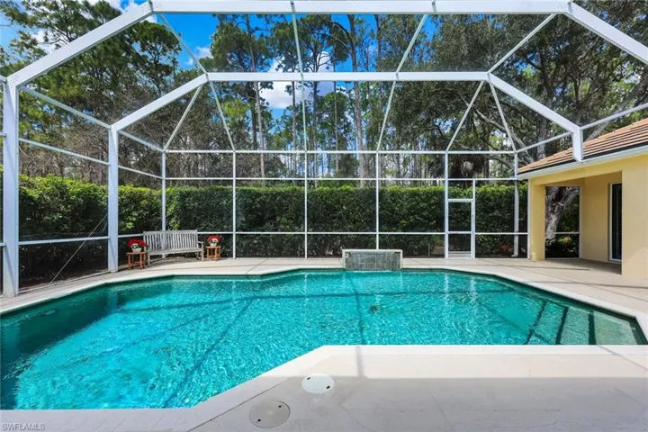Relaxing view of the backyard and preserve from the pool/lanai
