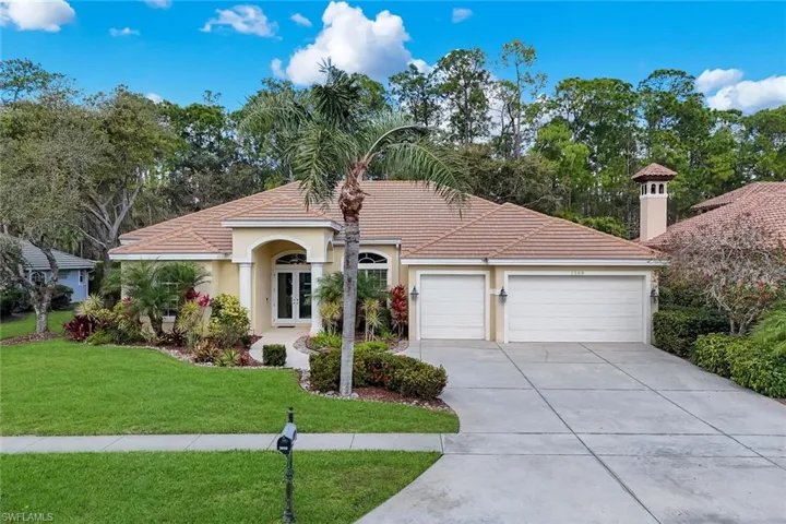 Single family home featuring an attached 3 car garage.