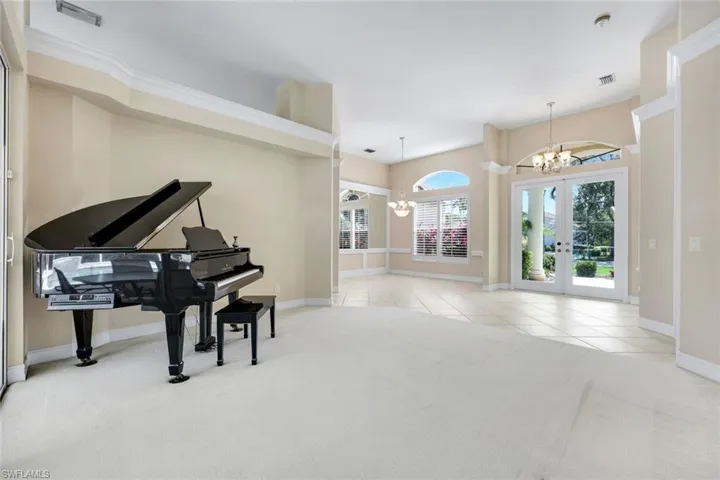 Double glass doors front entry into the Living Room and Dining Room.