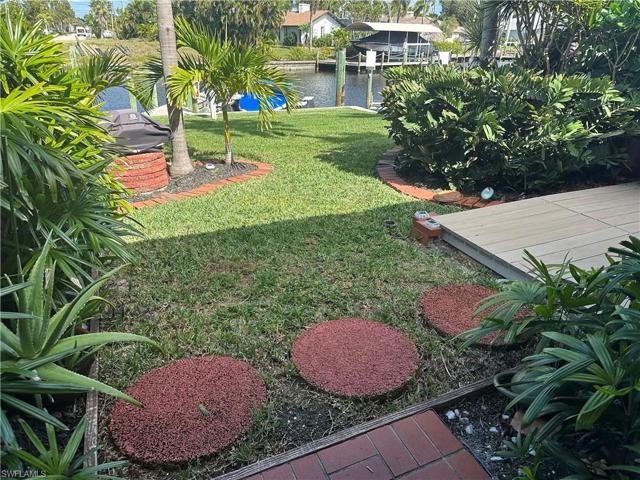 BUSHES HAVE BEEN TRIMMED FOR MORE WATER VIEW AND COULD BE TAKEN DOWN FURTHER !!