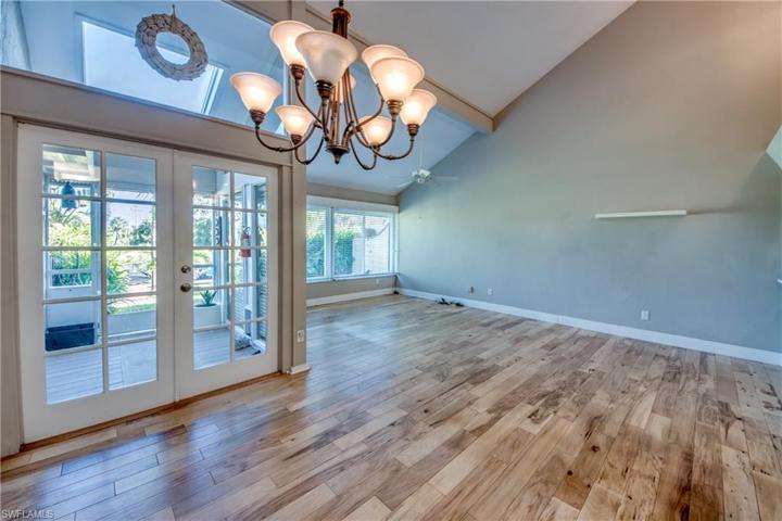 Grand Two Story Great Room with high windows