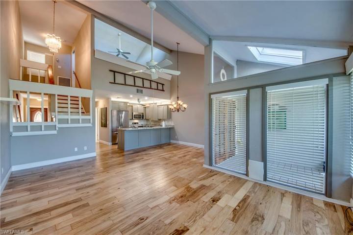 Grand Two Story Great Room with high windows