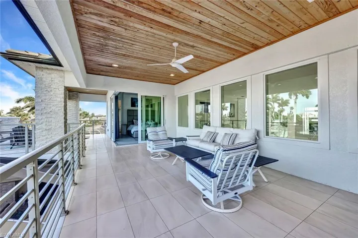 2nd master suite sliders open up to multiple waterfront balconies