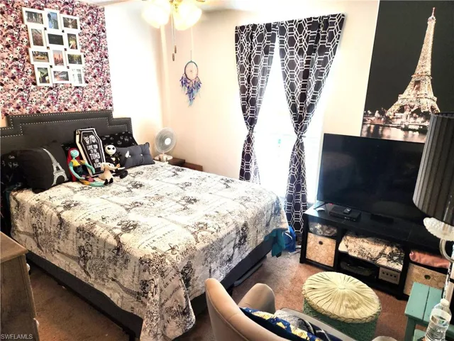 Bedroom with carpet flooring