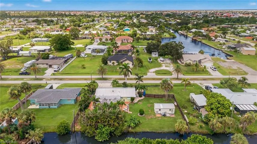 Aerial view of residential area with a nearby body of water