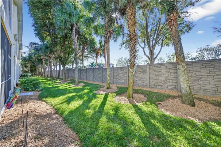 View of fenced backyard