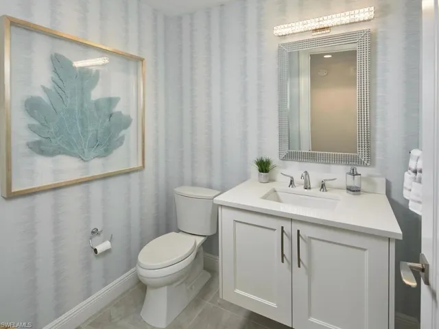Bathroom with vanity and toilet