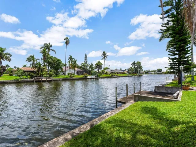 View of yard with a water view
