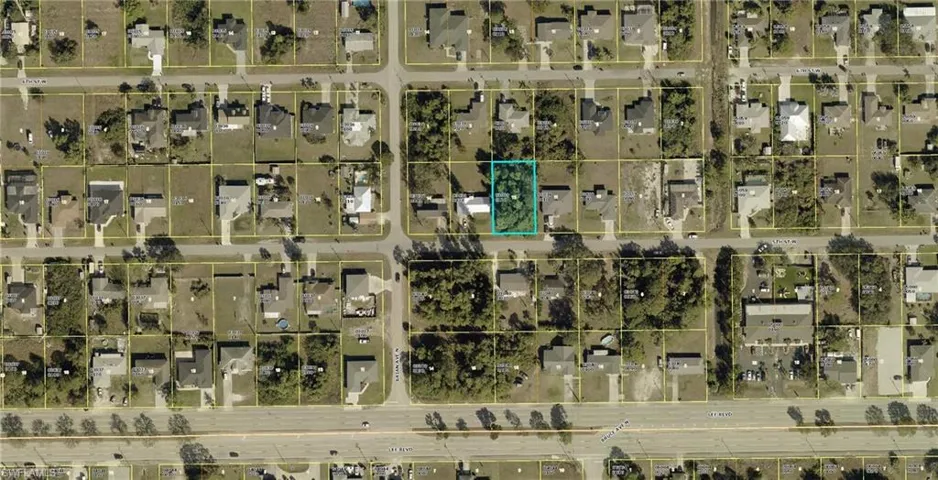 Aerial map of property and surrounding area featuring property parcel outlined