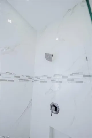 Bathroom with a tile shower