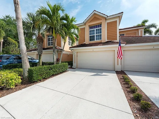 First floor corner unit with two car garage on quiet cul de sac.