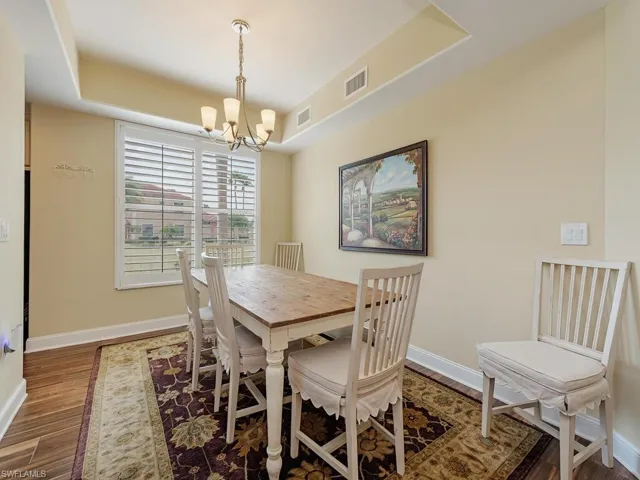 An open, airy dining area just off the kitchen and living area.