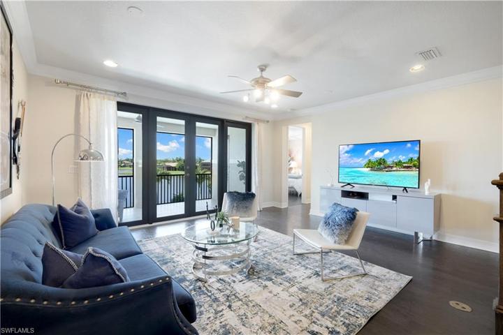 Upper level living area w/French Doors to the Balcony