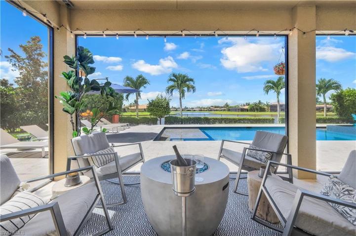 Screened Outdoor Patio + Entertaining Area outside of the Family Room