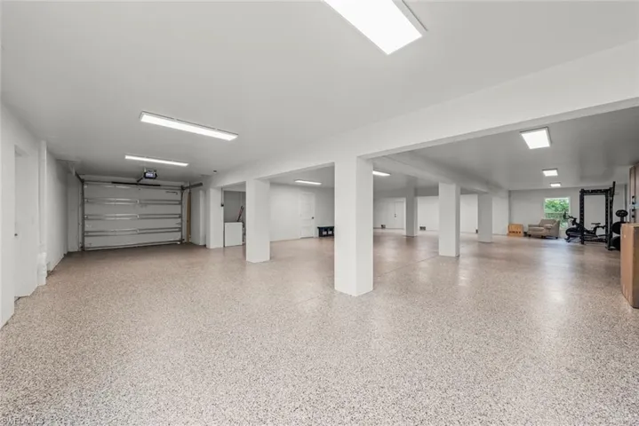 Expansive garage or storage area offering versatile use.