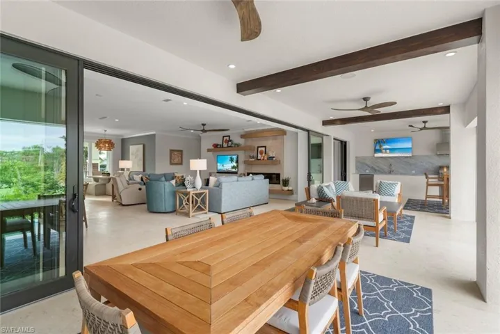 Patio area with dining table and easy access to interior spaces.