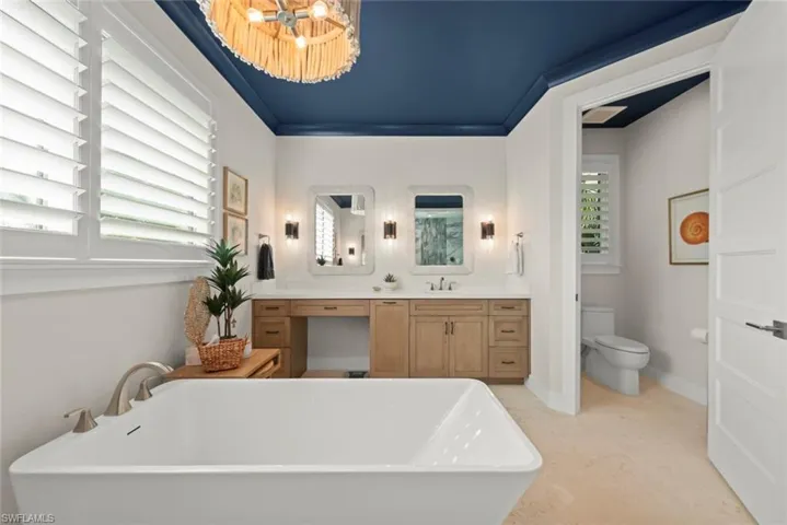 Elegant bath feature highlighting the freestanding tub.