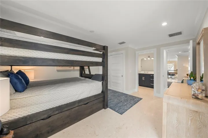 Another view of the room with a bunk bed.