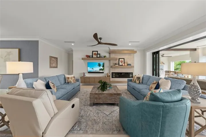 Living room showcasing generous seating and an open, airy layout.