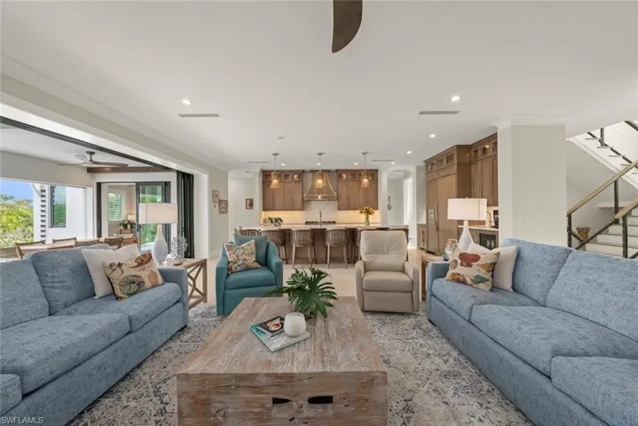 Living area with clear sightlines to the kitchen and dining spaces.
