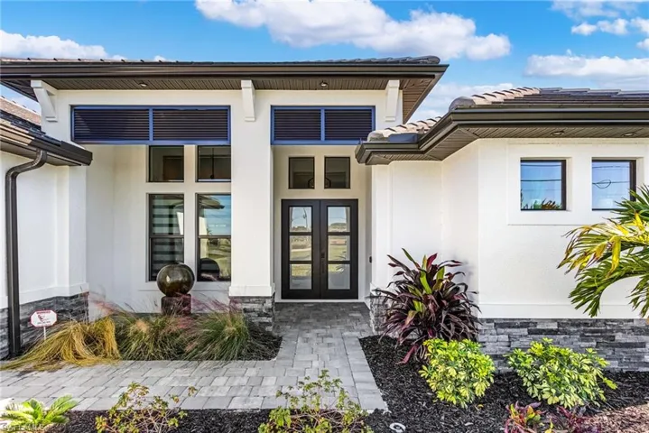 Entrance to property with french doors