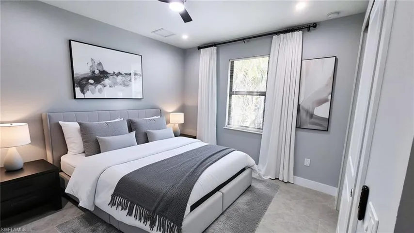Virtual staging. Bedroom featuring ceiling fan and baseboards