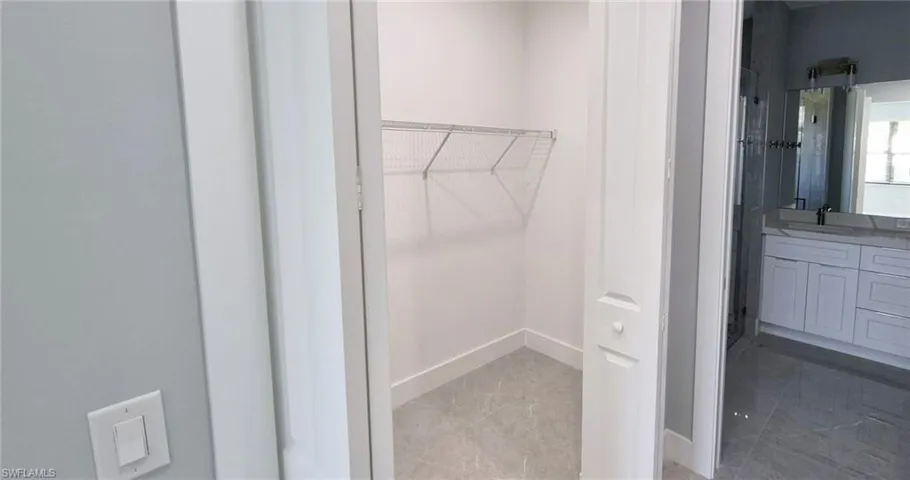 Closet featuring a sink