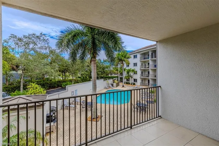 Balcony with view of pool