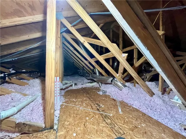 View of finished attic storage space