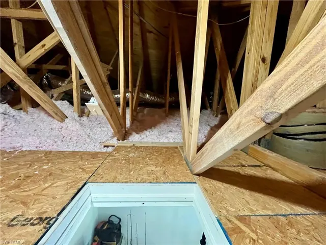 View of finished attic storage space