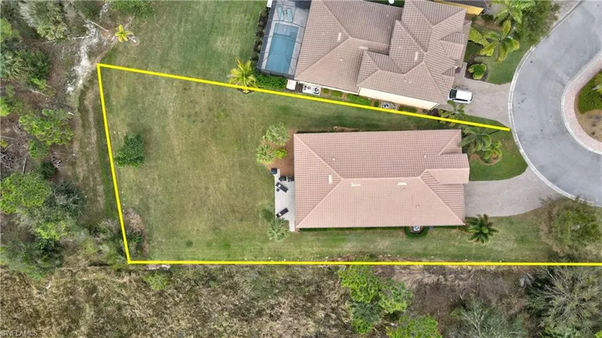 Aerial overview of property's location with property parcel outlined