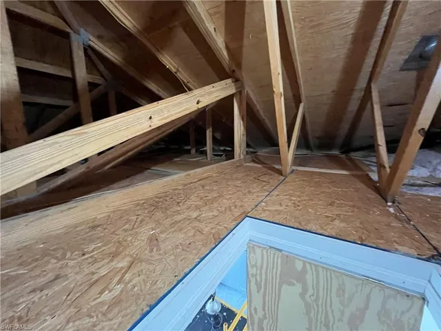 View of finished attic storage space