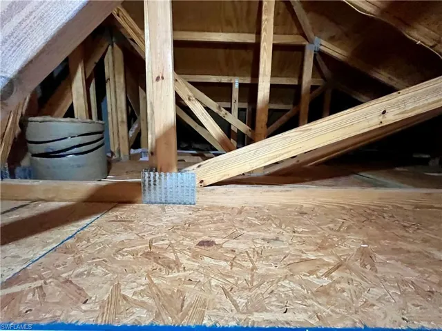 View of finished attic storage space