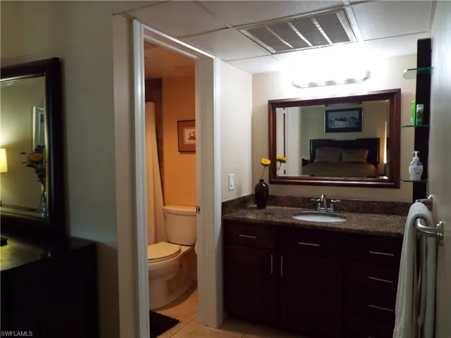 Bathroom has granite counter